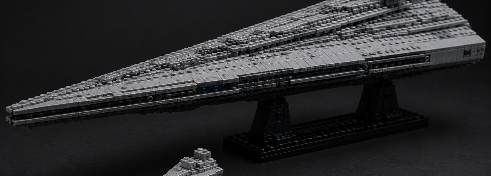 LEGO Star Wars Executor Super Star Destroyer shown with a small Star Destroyer and a micro Millennium Falcon represented on a single round 1×1 element.