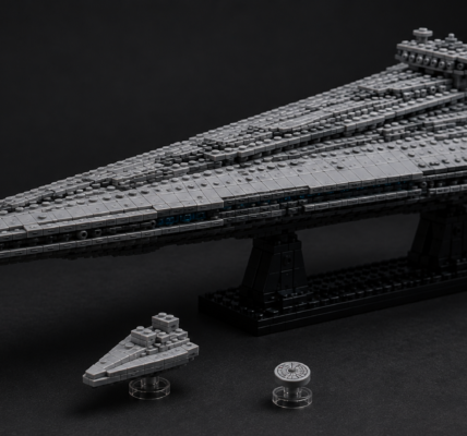 LEGO Star Wars Executor Super Star Destroyer shown with a small Star Destroyer and a micro Millennium Falcon represented on a single round 1×1 element.